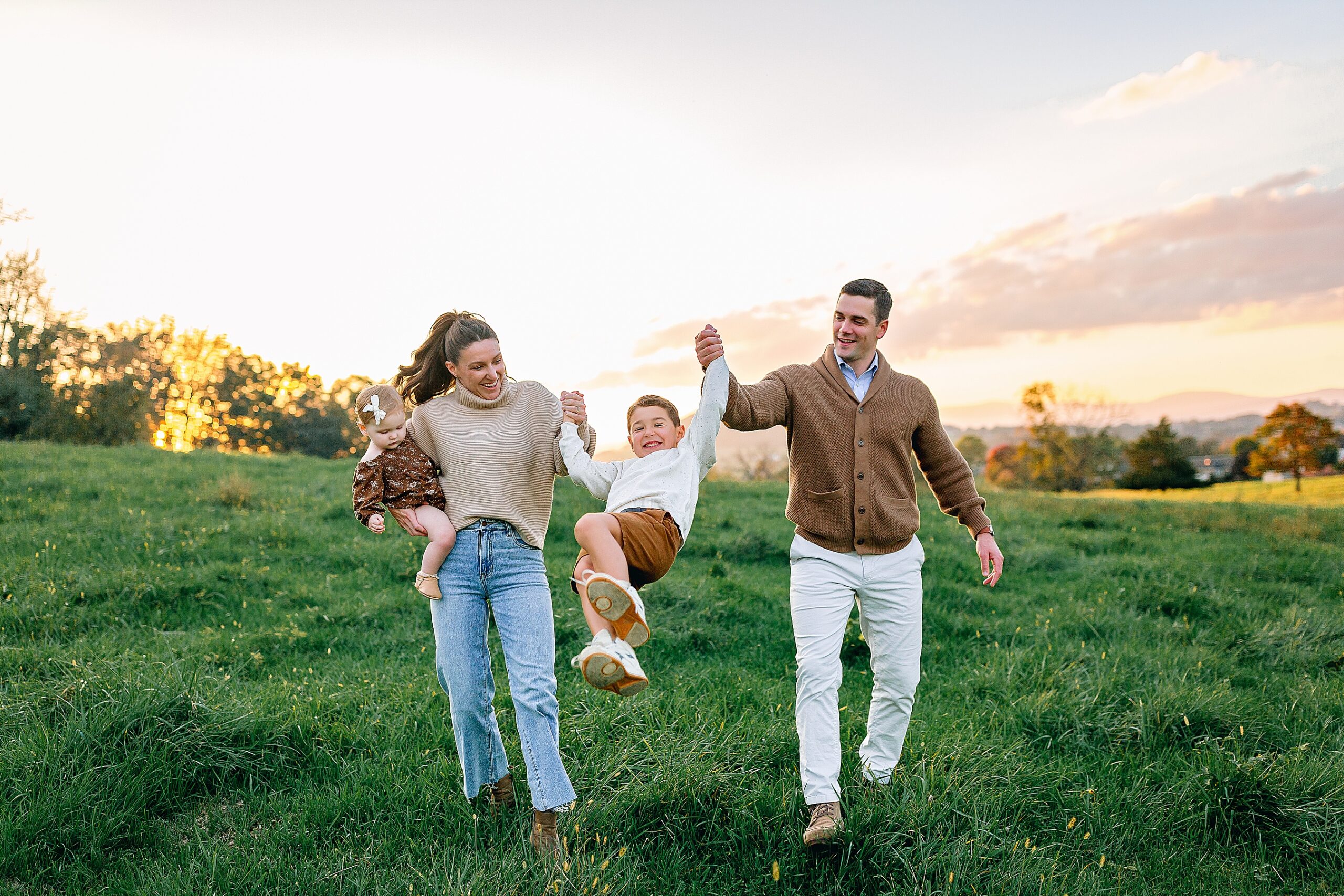 Family walking in a field