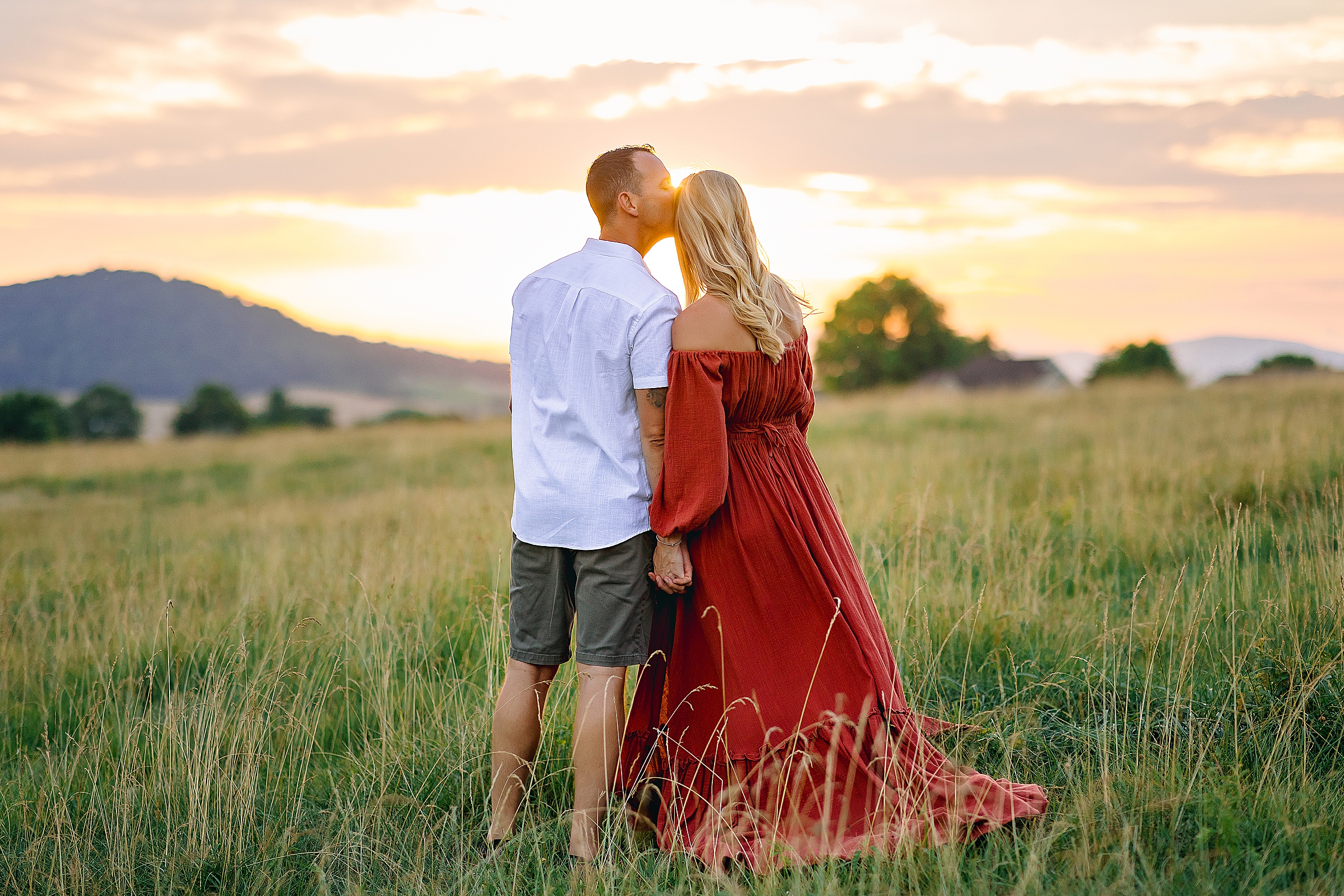 Husband and wife looking at the sunset