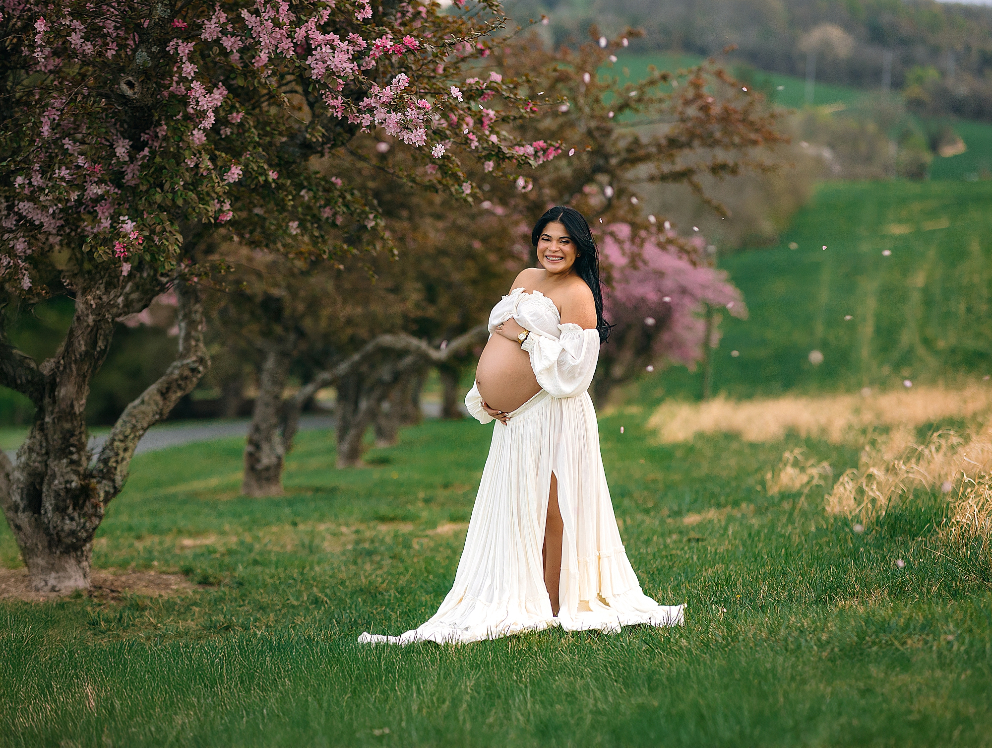 Maternity portraits in the spring with flowered trees